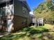 The backyard of the house features a door, stairs to a deck, and a grassy lawn at 4045 Westview St, Douglasville, GA 30135