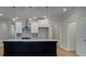 Kitchen with island and stainless steel hood range at 4525 Twinberry Dr, Powder Springs, GA 30127