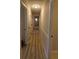 Hallway featuring wood-look flooring and neutral paint at 810 Gettysburg Trl, Kennesaw, GA 30144