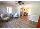 Bright and airy living room featuring stylish flooring, neutral walls, and a doorway to another room at 810 Gettysburg Trl, Kennesaw, GA 30144