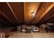 View of the attic showing stored boxes and bare wood rafters at 2075 Crabapple Parc Way, Roswell, GA 30076