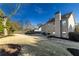 Beautiful backyard featuring patio, privacy fence and mature landscaping at 2075 Crabapple Parc Way, Roswell, GA 30076