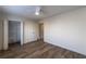 Spacious bedroom showing closets, wood laminate floor and a large sunny window at 2075 Crabapple Parc Way, Roswell, GA 30076