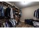 Walk-in closet with custom shelving and ample storage space at 2075 Crabapple Parc Way, Roswell, GA 30076