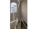 Two-story foyer with modern chandelier and large window with plenty of natural light at 2075 Crabapple Parc Way, Roswell, GA 30076