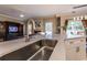 Spacious kitchen with island sink and countertops open to living space at 2075 Crabapple Parc Way, Roswell, GA 30076
