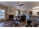 Open concept floor plan with living room, fireplace, and view into kitchen and dining at 2075 Crabapple Parc Way, Roswell, GA 30076