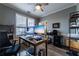 Home office space features wood floors and natural light, perfect for remote work at 2075 Crabapple Parc Way, Roswell, GA 30076