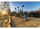 Community playground offers slides and climbing structures for recreation on a mulched surface at 2075 Crabapple Parc Way, Roswell, GA 30076