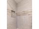 Modern shower with gray subway tile, recessed shelf and contemporary design for a spa-like experience at 2075 Crabapple Parc Way, Roswell, GA 30076