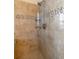 Tiled shower with a glass door and decorative mosaic tile accent stripe at 2075 Crabapple Parc Way, Roswell, GA 30076
