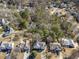 An aerial view shows the home nicely situated in its community at 239 Taylors Farm Dr, Canton, GA 30115