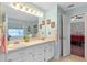Bright bathroom featuring a tub and double vanity at 239 Taylors Farm Dr, Canton, GA 30115