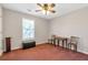 Bedroom featuring window, table, chair, and ceiling fan at 239 Taylors Farm Dr, Canton, GA 30115