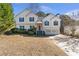 Charming two-story home with a well-manicured lawn, two car garage, and inviting front entrance at 239 Taylors Farm Dr, Canton, GA 30115