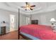 Spacious main bedroom with a coffered ceiling and neutral walls at 239 Taylors Farm Dr, Canton, GA 30115