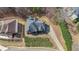 Bird's eye view of the house showing its roof, driveway, and the yard with shrubbery in its surroundings at 349 Azalea Chase Dr, Suwanee, GA 30024