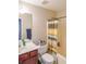 Bathroom with a shower-tub, white vanity and toilet at 349 Azalea Chase Dr, Suwanee, GA 30024