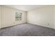 Comfortable bedroom with large windows and neutral paint at 858 Heritage Valley Rd, Norcross, GA 30093