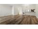 Open-concept dining area featuring neutral walls, vinyl floors, and ample space at 858 Heritage Valley Rd, Norcross, GA 30093