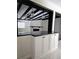 Open kitchen area featuring granite counters and view into adjacent living area at 6658 Collins Ct, Riverdale, GA 30274