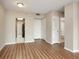 Open floor plan with hardwood floors providing access to the kitchen and bathroom at 1280 W Peachtree Nw St # 2302, Atlanta, GA 30309