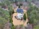 An aerial view of the home that features a lovely backyard pool, patio, and fence at 2915 Pruitt Rd, Cumming, GA 30041