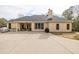 Spacious backyard featuring a large patio, perfect for outdoor dining and entertaining at 2915 Pruitt Rd, Cumming, GA 30041