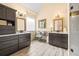 Elegant bathroom with dual vanities, decorative mirrors, and a spacious walk-in shower at 2915 Pruitt Rd, Cumming, GA 30041