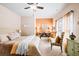 Cozy bedroom with neutral tones, decorative pillows, and a ceiling fan at 2915 Pruitt Rd, Cumming, GA 30041