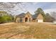 Beautiful brick home with a well-maintained yard and an attached two car garage at 2915 Pruitt Rd, Cumming, GA 30041