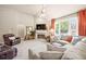 Bright living room featuring a vaulted ceiling, large windows, and a cozy sectional sofa at 2915 Pruitt Rd, Cumming, GA 30041