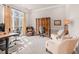 Bright and airy home office with a large window, comfortable seating, and ample workspace at 2915 Pruitt Rd, Cumming, GA 30041