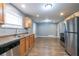 Well-lit kitchen features stainless steel appliances, modern countertops, and ample space at 3449 Hyland Dr, Decatur, GA 30032