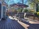 Lovely deck with outdoor seating and umbrella perfect for relaxation at 4584 Madison Place Ln, Atlanta, GA 30360