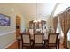 Formal dining room with wood floors, chandelier, and ample natural light at 4584 Madison Place Ln, Atlanta, GA 30360