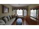 Sitting area with bay window, comfortable seating, and a decorative mirror at 4584 Madison Place Ln, Atlanta, GA 30360