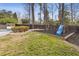 Backyard featuring a play area with slide and swings at 4755 Huntley Dr, Atlanta, GA 30342