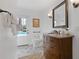 Bathroom vanity with view of backyard swimming pool at 4755 Huntley Dr, Atlanta, GA 30342