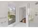 Bathroom featuring subway tile shower, modern fixtures, and a large window at 4755 Huntley Dr, Atlanta, GA 30342