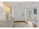 Welcoming foyer with hardwood floors, elegant console table, and decorative accents at 4755 Huntley Dr, Atlanta, GA 30342