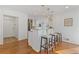 Kitchen island with pendant lights and barstool seating at 4755 Huntley Dr, Atlanta, GA 30342