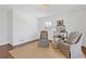 Cozy living room featuring hardwood floors, a patterned rug, and comfortable seating at 4755 Huntley Dr, Atlanta, GA 30342