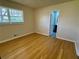 Bedroom with wooden floor and window allowing natural light at 1010 Wesley Park Sw Dr, Marietta, GA 30064