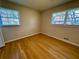 Bright bedroom with hardwood floors and natural light at 1010 Wesley Park Sw Dr, Marietta, GA 30064