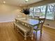 Bright dining room with hardwood floors and a large window providing natural light at 1010 Wesley Park Sw Dr, Marietta, GA 30064