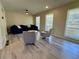 Bright living room with modern flooring, neutral paint, and large windows at 1010 Wesley Park Sw Dr, Marietta, GA 30064