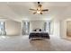 Bedroom featuring neutral walls, carpeted floors, a queen bed, and two windows at 1734 Cadence St, Locust Grove, GA 30248