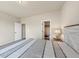 Relaxing bedroom with an en-suite bath, carpet flooring, and a calm color palette at 1734 Cadence St, Locust Grove, GA 30248