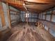 Interior of garage reveals an unfinished space with some exposed beams and wooden floor at 2084 North Rd, Snellville, GA 30078